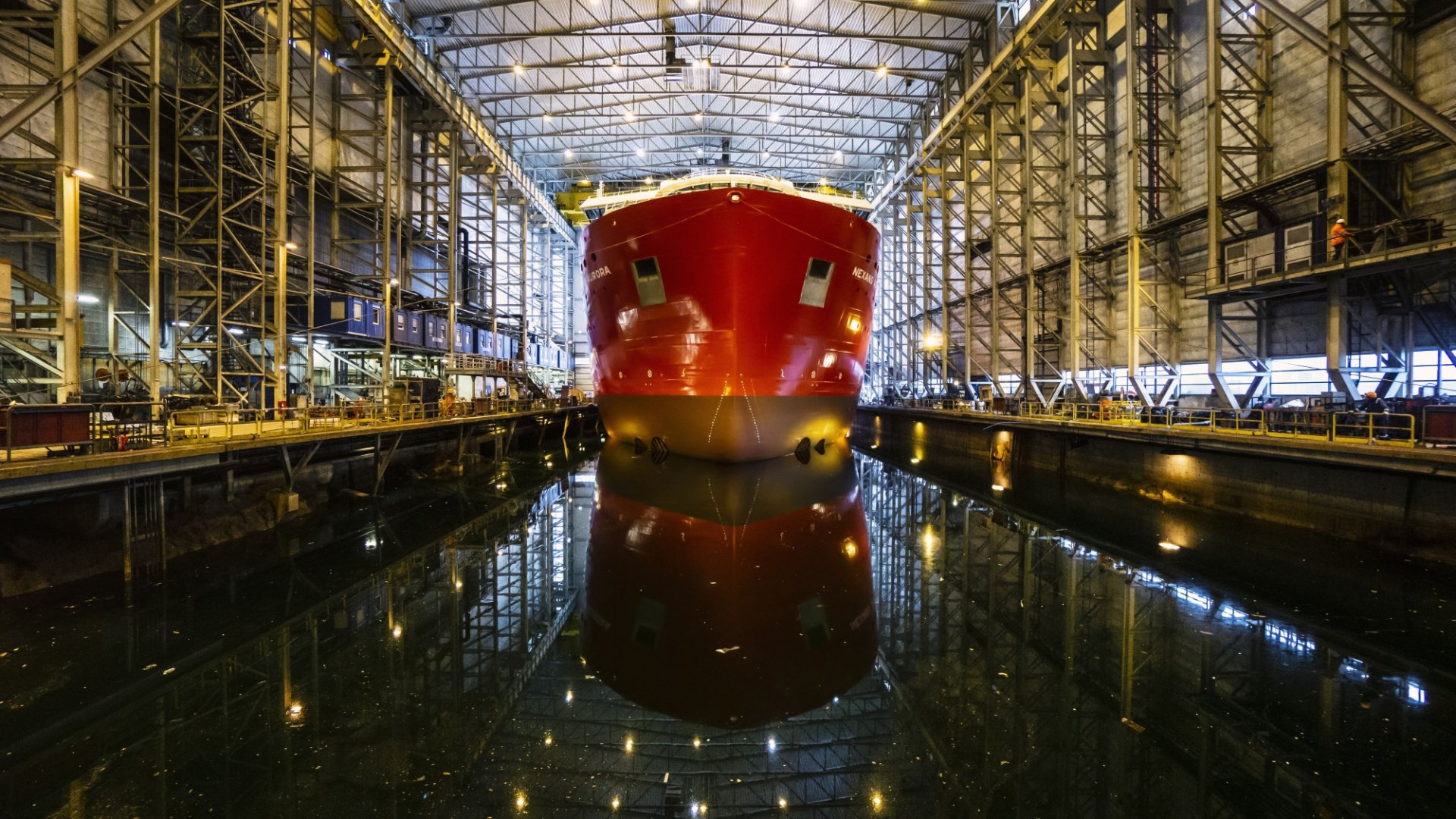 Nexans Aurora being towed out of the dock hall at Ulstein Verft.