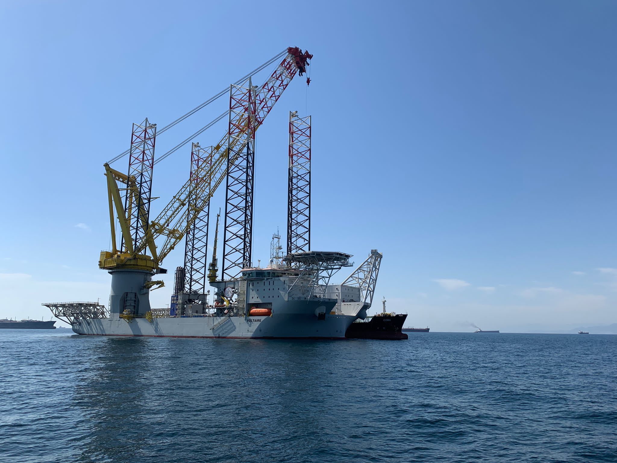 A photo of Jan De Nul's jack-up vessel Voltaire sailing at sea