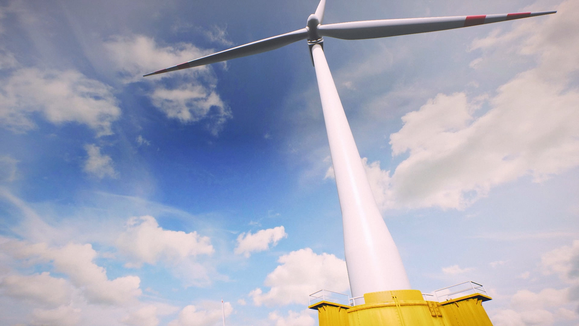 An offshore wind turbine photographed from the base up