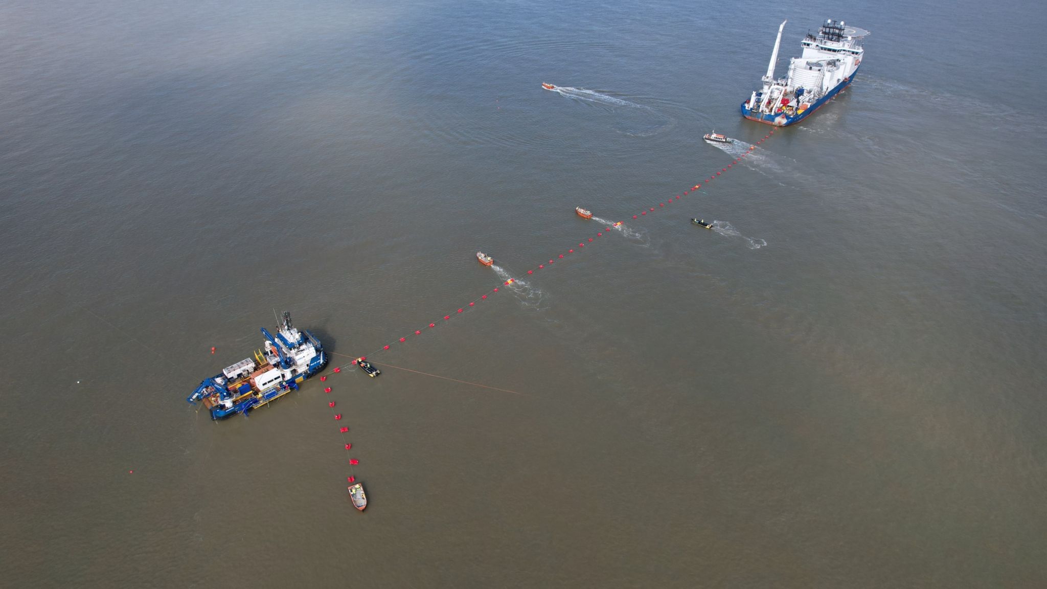 NKT cable laying vessel at East Anglia Three export cable landfall in Suffolk